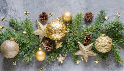 christmas composition fir tree branches christmas golden decorations on gray background flat lay top view copy space