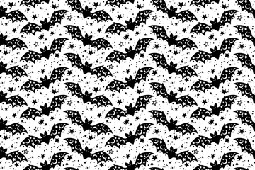 Seamless vector pattern with black drawn stylized bats and stars