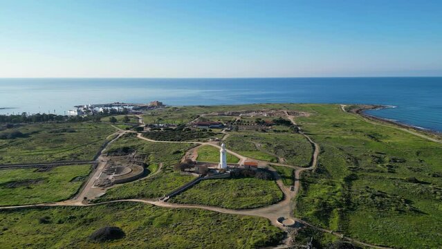 Aerial footage of Paphos Lighthouse and the Archaeological Site of Nea Paphos in Paphos city, Cyprus