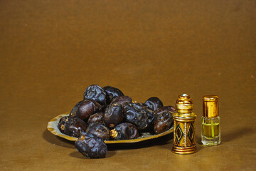 Kurma Ajwa, Ajwa Dates, served in traditional metal plate with misk oud perfume, Kurma Ajwa is one of the special fruit from Madina City