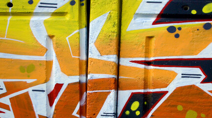 Colorful background of graffiti painting artwork with bright aerosol outlines on wall. Old school...