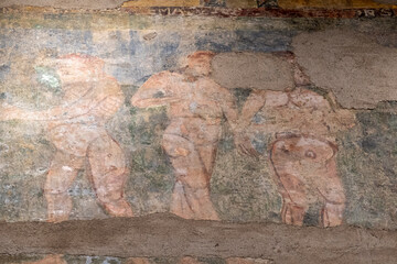 Fototapeta na wymiar mural paintings of Ruesta, 12th century, fresco torn and transferred to canvas, come from the church of San juan bautista in Ruesta, Diocesan Museum of Jaca, Huesca, Spain