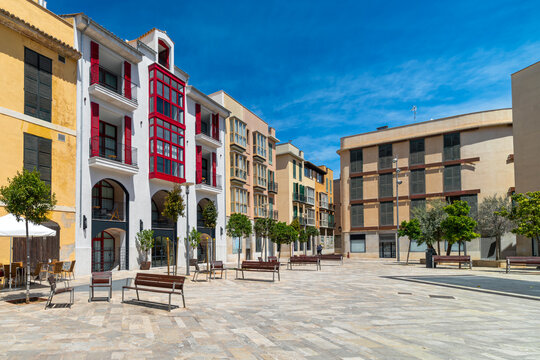 Colorful building on small town square in Palma, Spain.