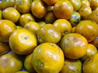 Close up Many oranges at the morning market