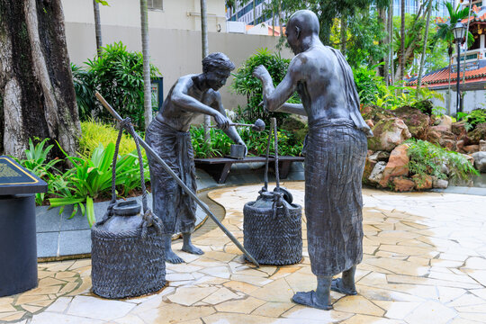 Sculpture by Lim Leong Seng which depicts the Indian settlers of Telok Ayer. Telok Ayer Green, Singapore