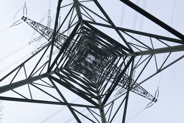 Large steel truss mast, electricity overhead line mast, view from below