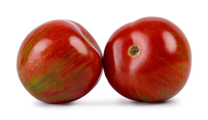 Red with green striped black zebra tomatoes, isolated on a white background.