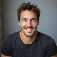 Fototapeta premium Radiant Confidence: A Charming Portrait of a Smiling Man. Strength and positivity of a person on a clean, isolated background. The power of a confident smile.