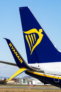 Salzburg, Austria - January 27, 2024: Airplane tail logo and winglet with Ryanair logo and corporate design