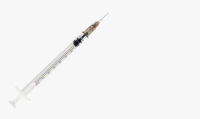 Insulin syringe. on a light background.