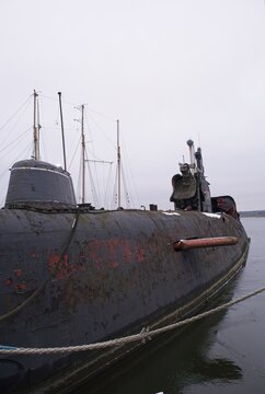 Peenemunde, Germany - Jan 10, 2024: Conventionally powered submarine JULIETT U-461. Former Baltic red banner fleet and pier of the 1st Flotilla. Cloudy winter day. Selective focus
