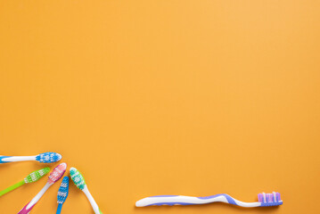 Colorful toothbrush background.  Dental health, care, hygiene awareness.