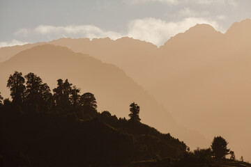 Sunrise in the misty mountains of northern Patagonia, Chile