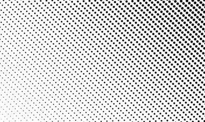 Halftone dotted texture grunge background. Abstract black and white halftone dotted background.