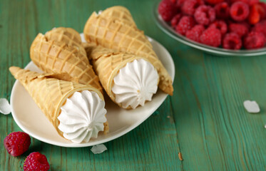 vanilla ice cream in a waffle cone