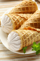 vanilla ice cream in a waffle cone