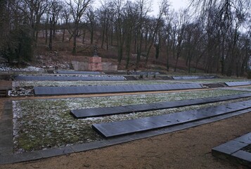 Bad Freienwalde, Germany - Jan 13, 2024: This war cemetery contains the graves of 1,843 Soviet soldiers and officers who fell in 1945 during Second World War. Cloudy winter day. Selective focus