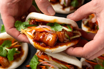 Bao buns with pork belly and vegetable. Asian cuisine - obrazy, fototapety, plakaty