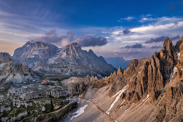 Cloudy evening above the jagged ranges of the Italian Dolomites