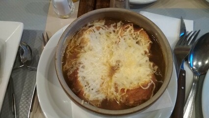 Traditional French food, onion soup. Delicacy in Paris.