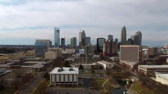Aerial Upward Shot Of Downtown District In Residential City Under Cloudy Sky - Charlotte, North Carolina