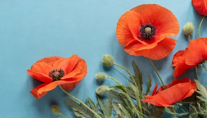 Deurstickers banner with red poppy flowers on blue background symbol for remembrance memorial anzac day © Richard