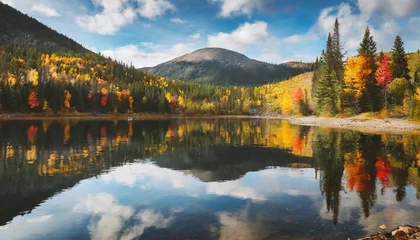 Wall murals Reflection autumn forest reflected in water colorful autumn morning in the mountains colourful autumn morning in mountain lake colorful autumn landscape autumn in canada