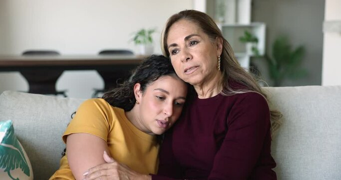 Loving mature mom gives wise advice to grown up daughter, supports her in difficult life period, encourages with warm words, shares feelings, is near, coping together with break up, personal concerns