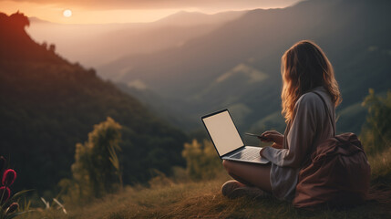 Young woman freelancer traveler working online using laptop, enjoying beautiful nature landscape with mountain view at sunrise, remote work concept