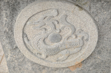 a Chinese dragon of stone at outdoor