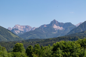 Scenic view of majestic mountain peaks of Karawanks seen from Feistritz im Rosental, Carinthia, Austria. Majestic Wertatscha and Kosiak summit in summer. Hiking in alpine wilderness Austrian Alps