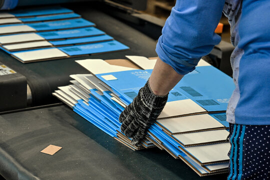 cardboard packaging box cardboard production labor business paper hands strong