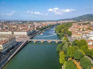 The drone aerial view of Po River and Turin city, Italy. The Po is the longest river in Italy.	
