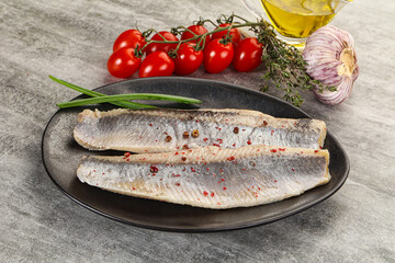 Marinated herring fillet with green onion