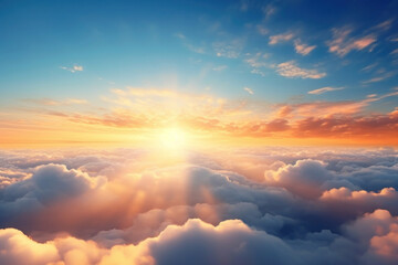 Naklejka na ściany i meble Beautiful sunrise sky above clouds with dramatic light in the morning.