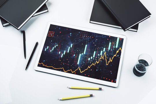 Modern digital tablet monitor with abstract creative financial chart, research and analytics concept. Top view. 3D Rendering