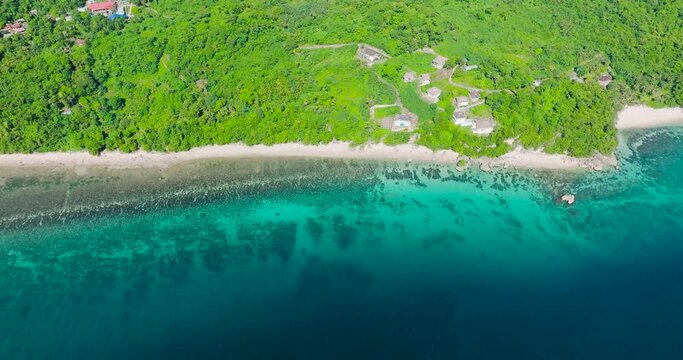 Nature scenery of coastline area with greenish water and beach in Carabao Island, San Jose. Romblon. Philippines.