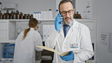 In the heart of science, two devoted lab mates, man and woman scientists, deep in conversation on...