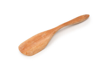 Wooden spatula for spices, tea isolated on a white background.