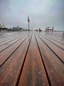 Looking down the boardwalk on a rainy day in Belmar, New Jersey 