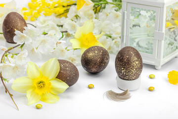 Festive Easter composition with traditional decoration. Spring flowers, Eggs, flower lantern