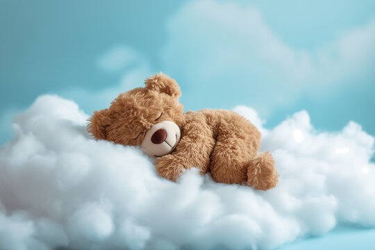 A little teddy bear sleeping on a cloud. Concept of children's dreamy dreams. Nursery theme