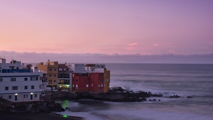 colorful sunrise on the ocean coast, tenerife, canary islands, spain