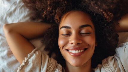 young african american woman relaxing with eyes closed at home, she is smiling