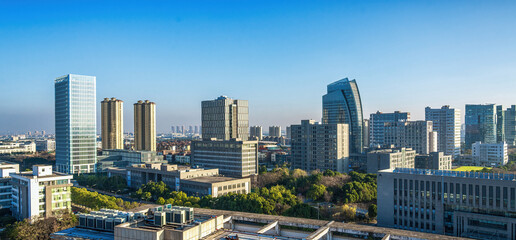 Fototapeta na wymiar Modern Cityscape with Blue Sky
