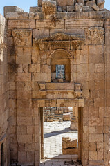 Vertical veiw of the gate of the Propylaeum at ruins of Jerash.  Jordan.