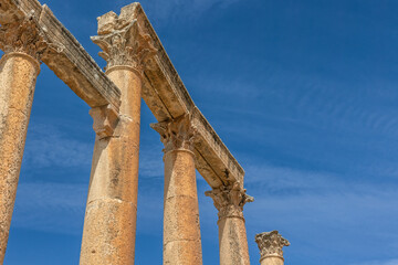 Ancient columns at the archaeological site of Jerash. Jordan.   There is enough space for your use in the photo.