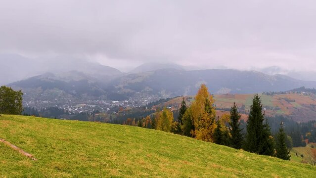 rainy weather in the Carpathians, Ukraine, the village of Verkhovyna, haystacks, autumn forests, roads, houses of the Hutsul mountaineers, dogs - wonderful and poetic for the traveler