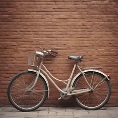 A vintage bicycle parked next to a brick wall with a blurry background