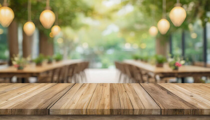 Empty rustic wood table with blurred soft light table in restaurant with bokeh background. Business presentation., product display template Mock-up.